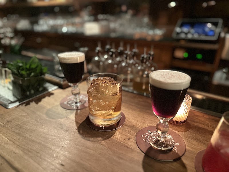 Friends toasting at The Dead Rabbit